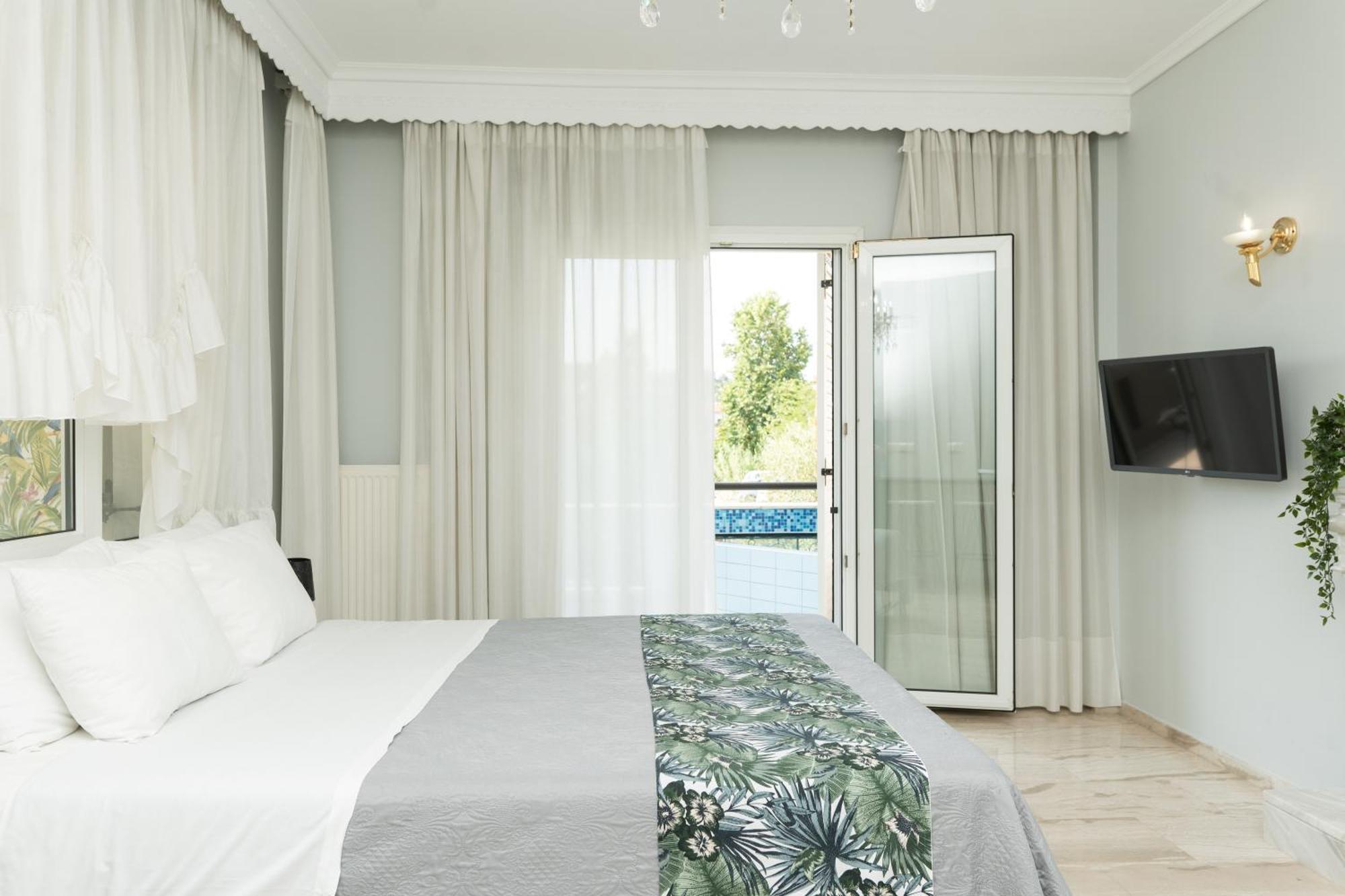 Glykanisos Suites Néa Péramos Exterior foto